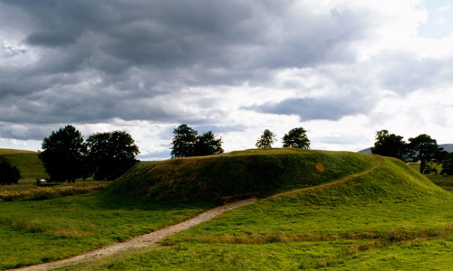 A path leading up the grassy earthworks.
