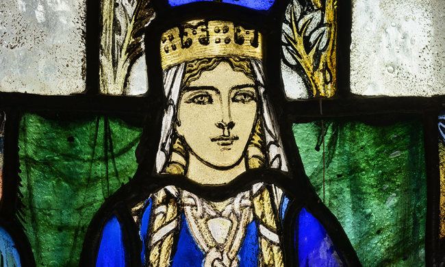 Stained glass window depicting St Margaret