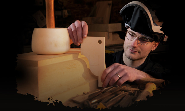 A man working with wood