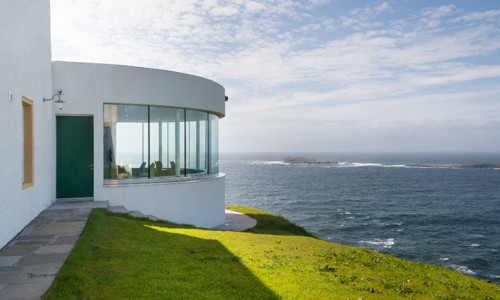 A view of Sumburgh Head Lighthouse looking out to sea. 