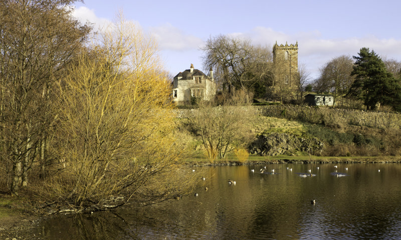 Duddingston Kirk, seen from across the loch, at Holyrood Park.