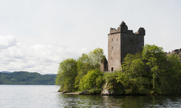 Urquhart Castle pictured from a boat on Loch Ness. 