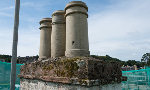 Repair work on a traditional chimney.