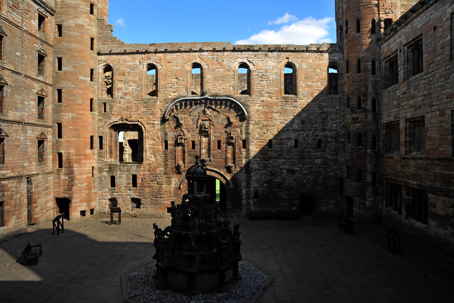 A view of the courtyard and fountain at Linlithgow Palace.