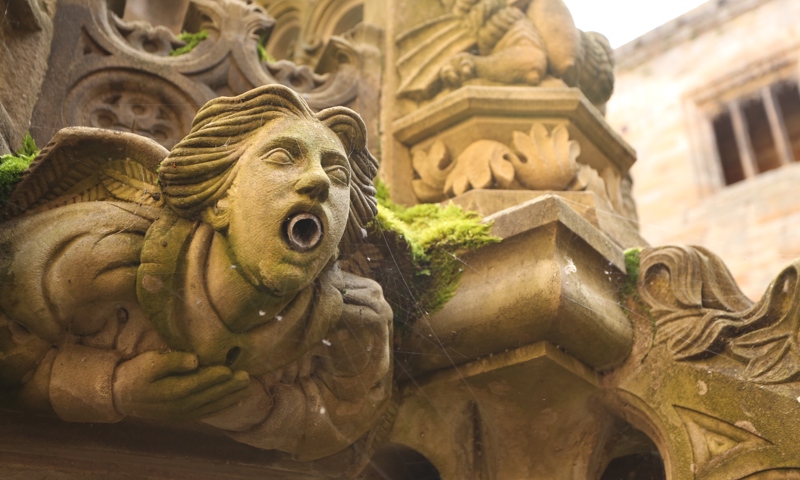 A detail of the fine carved stone fountain in the courtyard at Linlithgow Palace.