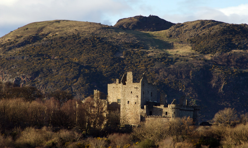 A general view of Craigmillar Castle, with Arthur’s Seat behind it.