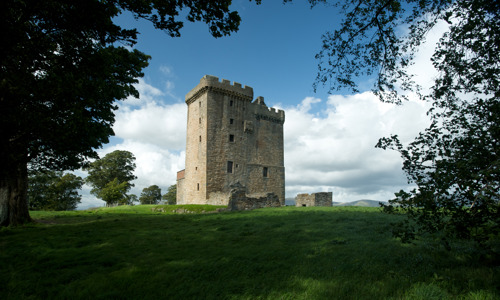 The imposing Clackmannan Tower framed by trees.