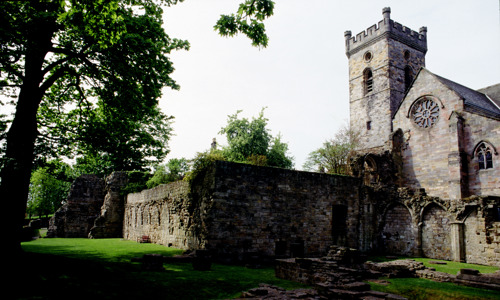 The ruined remains of Culross Abbey next to the well preserved Parish Church.