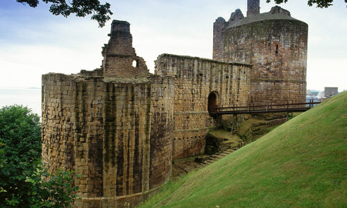 The ruins of Ravenscraig Castle with its big round tower in the foreground