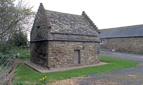 A small building that looks like a house but is Tealing Dovecot
