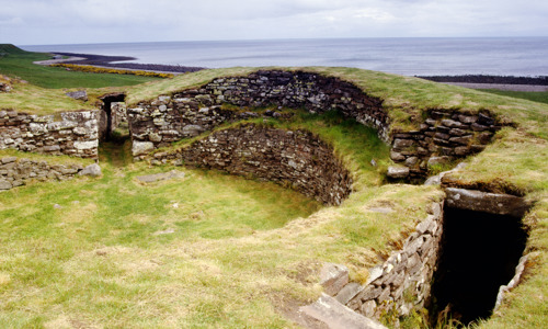 The remaining walls of the broch form a half circle and are about three metres high. 