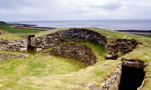 The remaining walls of the broch form a half circle and are about three metres high. 
