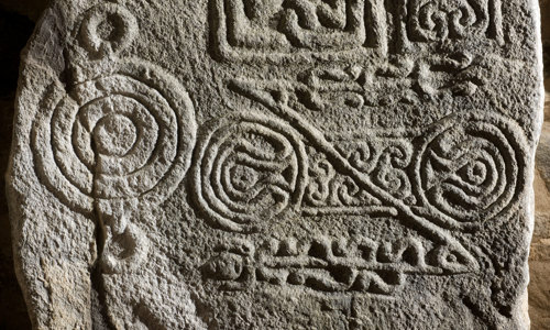 Carvings on the Dyce Symbol Stone, including a variety of circles