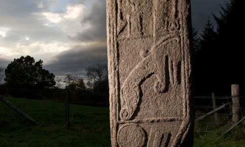 A tall carved stone 