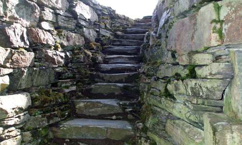 Stone stairs with stone walls to both sides