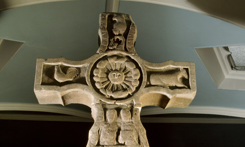 An ornately carved stone cross