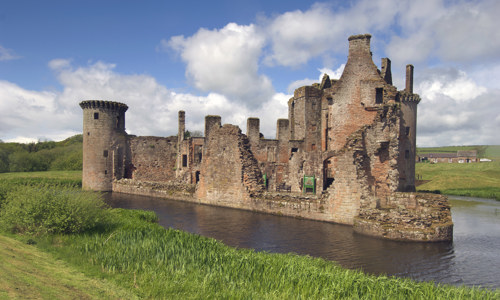 A general view of Caerlaverock Castle and its surrounding moat
