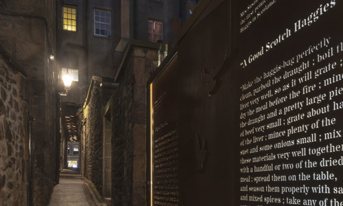 A narrow, historic alleyway (known as a 'Close' in Scotland)