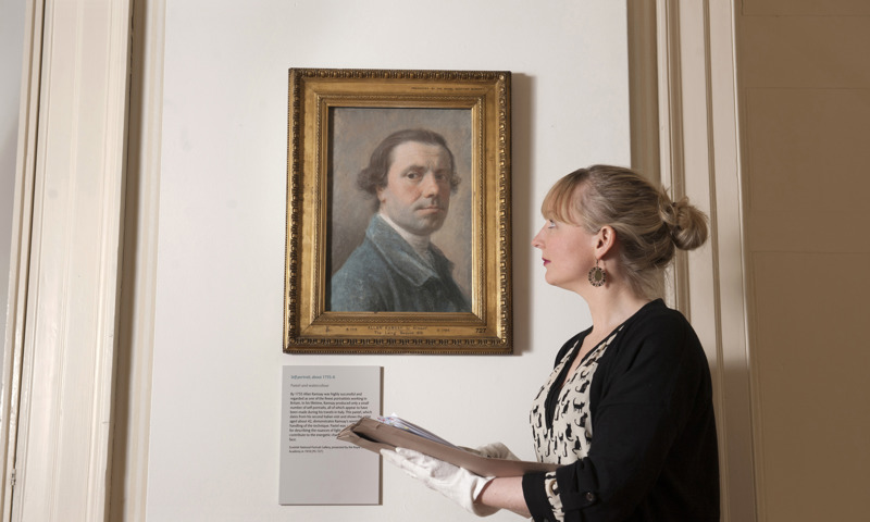 National Galleries of Scotland prints and drawings curator Trine Nordkvelle with a self-portrait by Allan Ramsay from an exhibition at Duff House.
