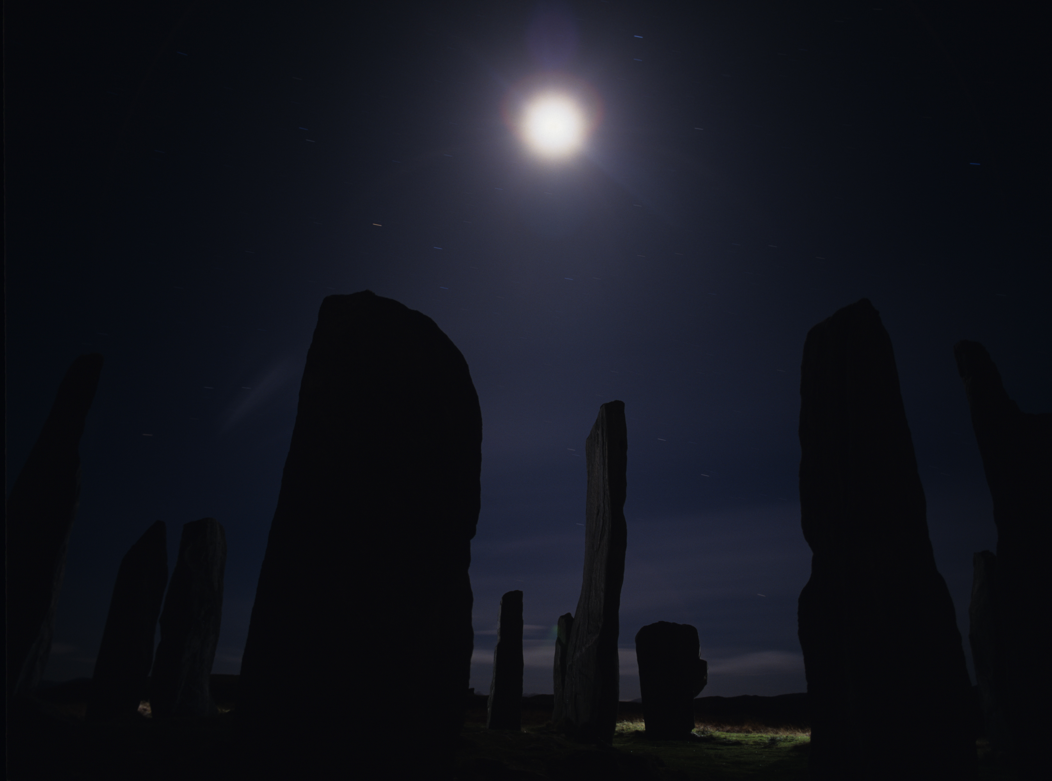 The moon over the standing stones at Calanais.