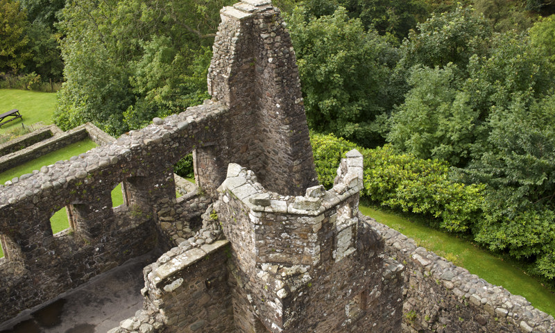 A view looking down on the remains of an area of Castle Campbell from the ramparts.