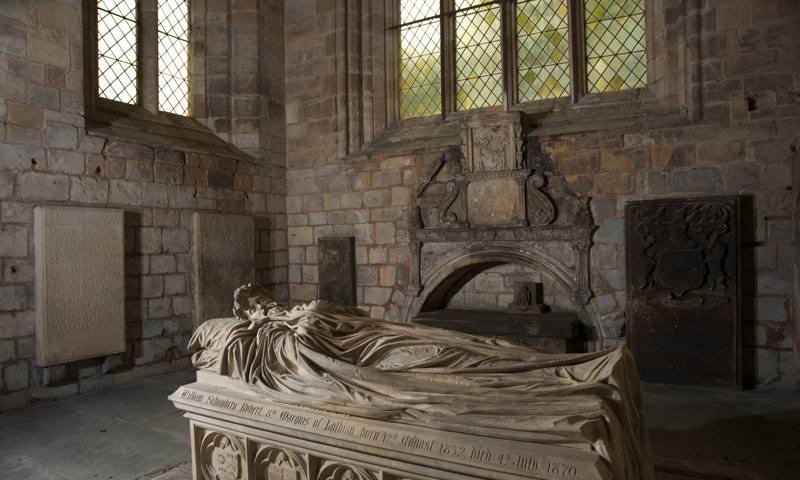 The Lothian Aisle, with the William Schomberg monument in the foreground, at Jedburgh Abbey.