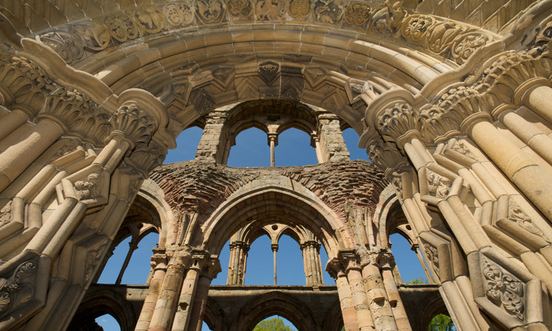 A detail of arches seen through a doorway at Jedburgh Abbey.