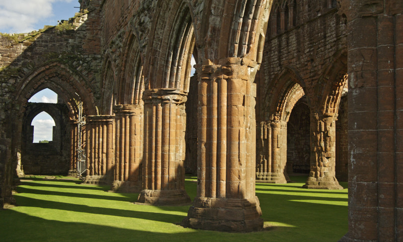 A view of the cloister at Sweetheart Abbey.