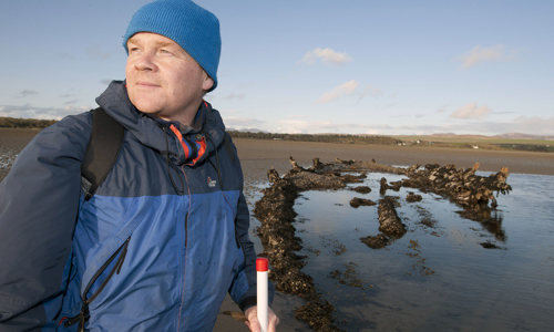 A member of staff conducting research on a historic marine protected area.