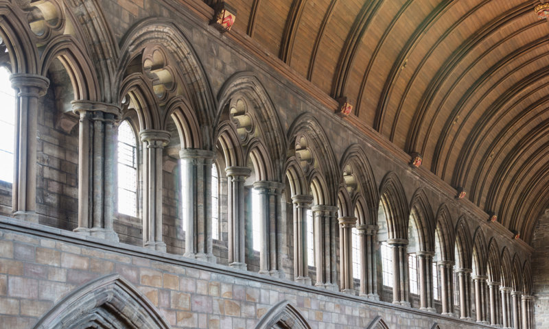 A detail of the ceiling and arched windows inside Dunblane Cathedral.