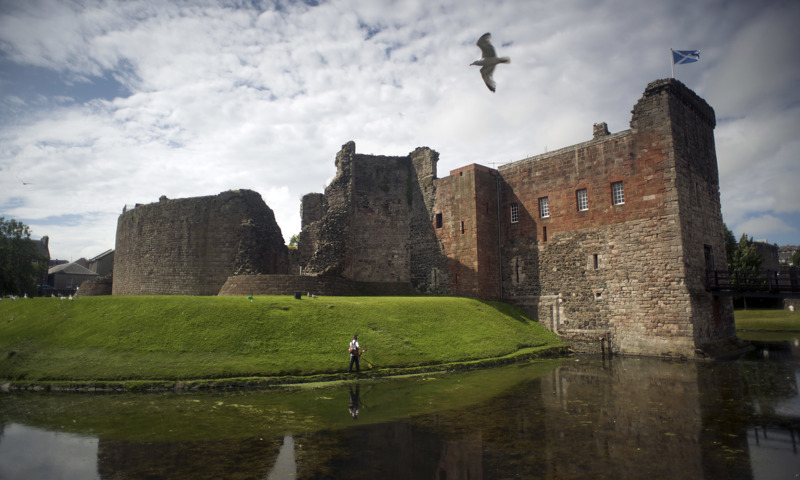 A view of the moat and tower at Rothesay Castle.