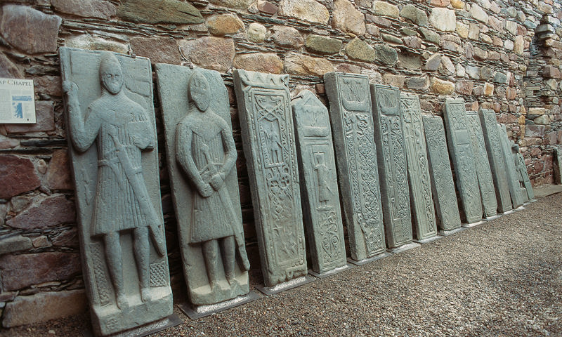 A row of sculptured stones at Kilmory Knap Chapel.