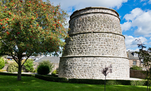 A complete, round dovecot with three white-stones layers