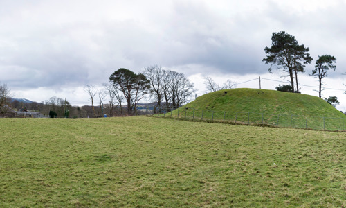 A grass covered castle mound