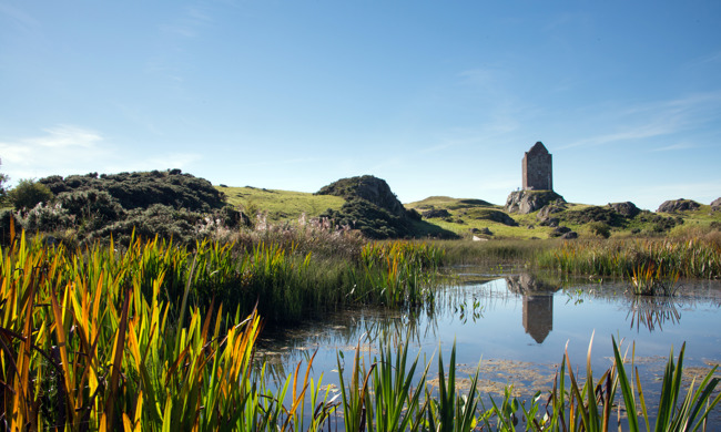 A distant view of Smailholm Tower.