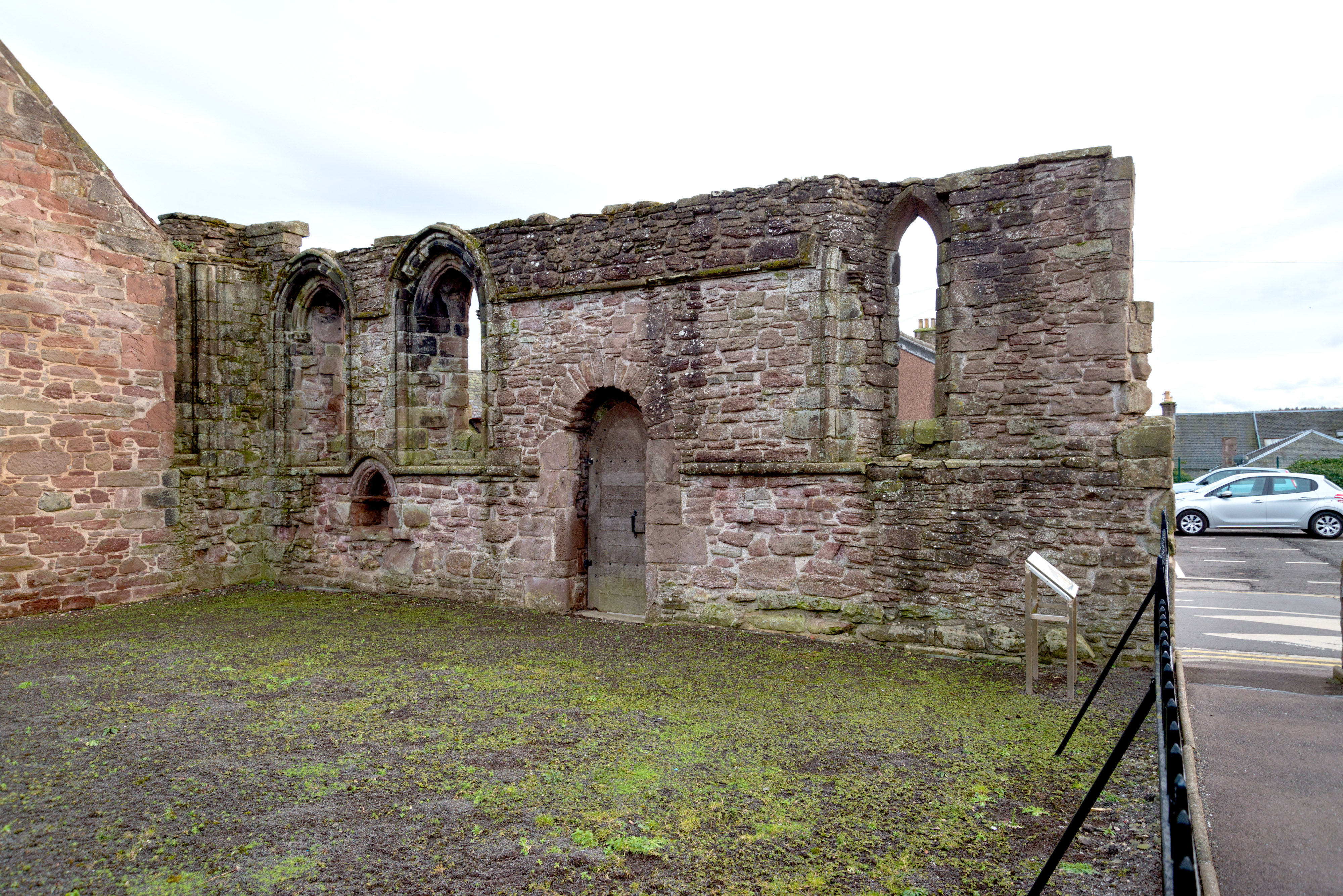 A solitary wall, all that remains of Maison Dieu