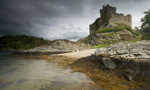 The remains of Castle Tioram, seen from the shore of Loch Moidart.