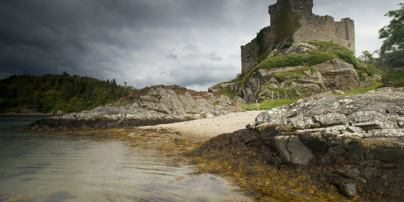 The remains of Castle Tioram, seen from the shore of Loch Moidart.