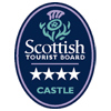 A graphic of a dark blue oval with a thistle at the top and the words "Scottish Tourist Board", followed by four stars.