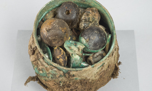 A pot containing Viking relics found during archaeological excavations in Dumfries and Galloway.