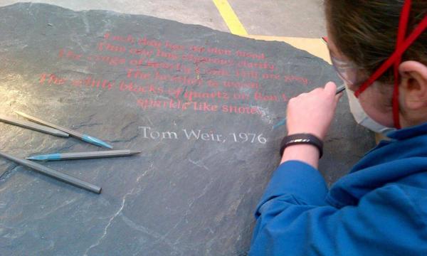 Tom Weir quotation carved into black stone