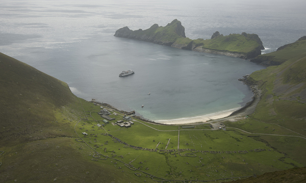 The bay at St Kilda, showing the beach, the ocean, the town and the hills