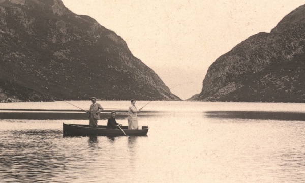 Photograph from an album from  around 1880 showing visitors fishing on Loch Beinn Taighe, Eigg. The image is labelled, Loch where we caught a fish.