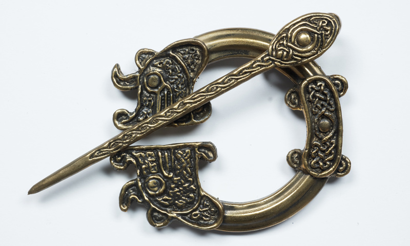 a Celtic Penannular brooch from a Historic Environment Scotland handling box