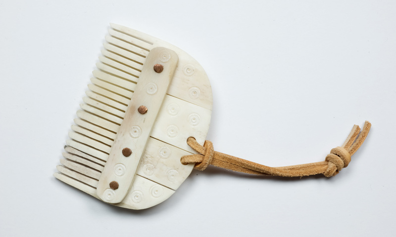 A replica Pictish bone comb from the Pictish life handling box