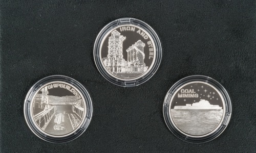 Set of three industry memorabilia coins for iron and steel, shipbuilding and coal mining