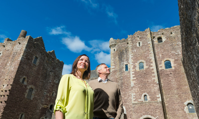 A couple visiting Doune Castle