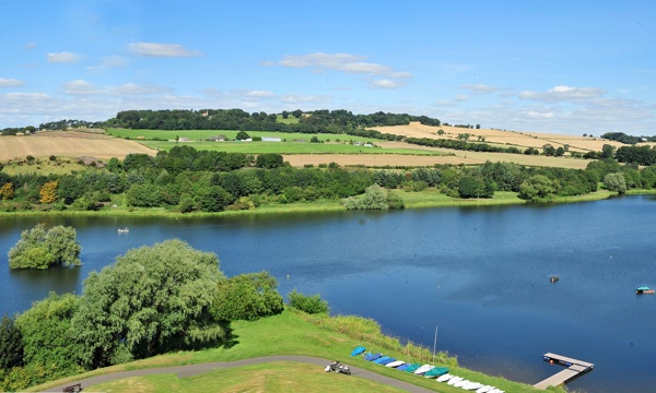 Linlothgow Loch with pier, and surrounding grass land and farms