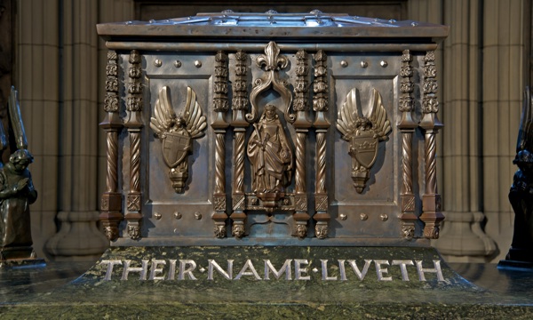 War memorial with plaque that reads "Their name liveth"