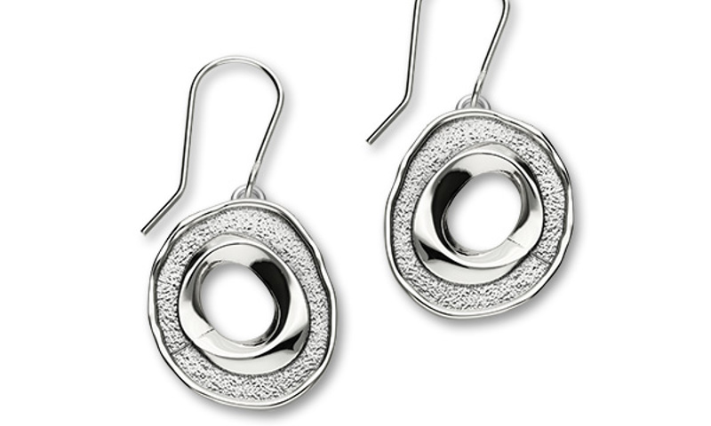 Silver circular earrings with clear gem in the centre